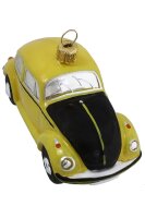 Der gelbe VW Käfer mit schwarzer vorderer Haube ist...