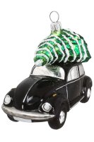 von oben ist der schwarze VW Käfer mit Tannenbaum...