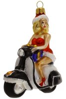 Die Natur ist unser Vorbild !
Ms. Santa auf ihrem Motorroller ist eine beliebte Figur a...